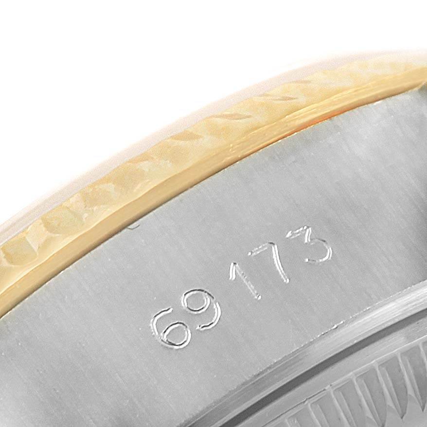 This image shows a close-up of the case edge and reference number of a Rolex Datejust 69173 Women's Stainless Steel Champagne Dial 69173 Women's Stainless Steel Champagne Dial model.
