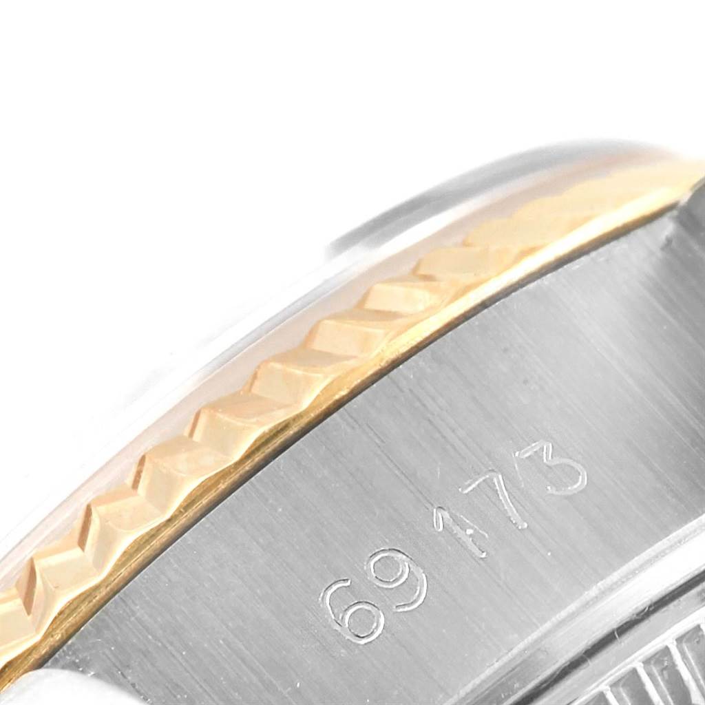 This close-up image shows the side view of the bezel and case edge of a Rolex Datejust 69173 Women's Stainless Steel Black Dial 69173 Women's Stainless Steel Black Dial watch, featuring the model number 69173.