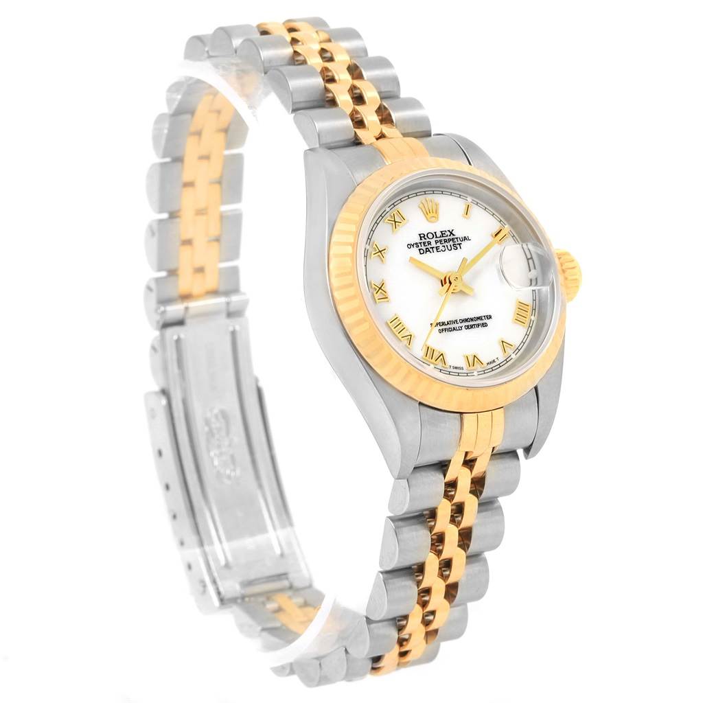 The image shows a side angle of the Rolex Datejust 79173 Women's Steel and Gold (two tone) White Dial 79173 Women's Steel and Gold (two tone) White Dial watch, highlighting its gold and silver bracelet, bezel, and dial.