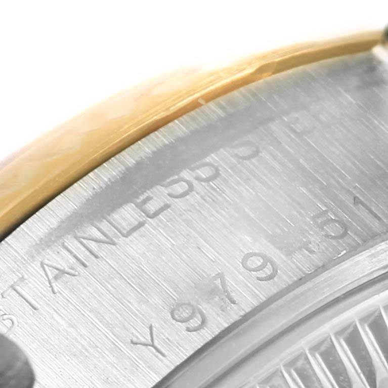 The image shows a close-up of the stainless steel case back of a Rolex Datejust 79173 Women's Steel and Gold (two tone) White Dial 79173 Women's Steel and Gold (two tone) White Dial watch, highlighting the engraved text.