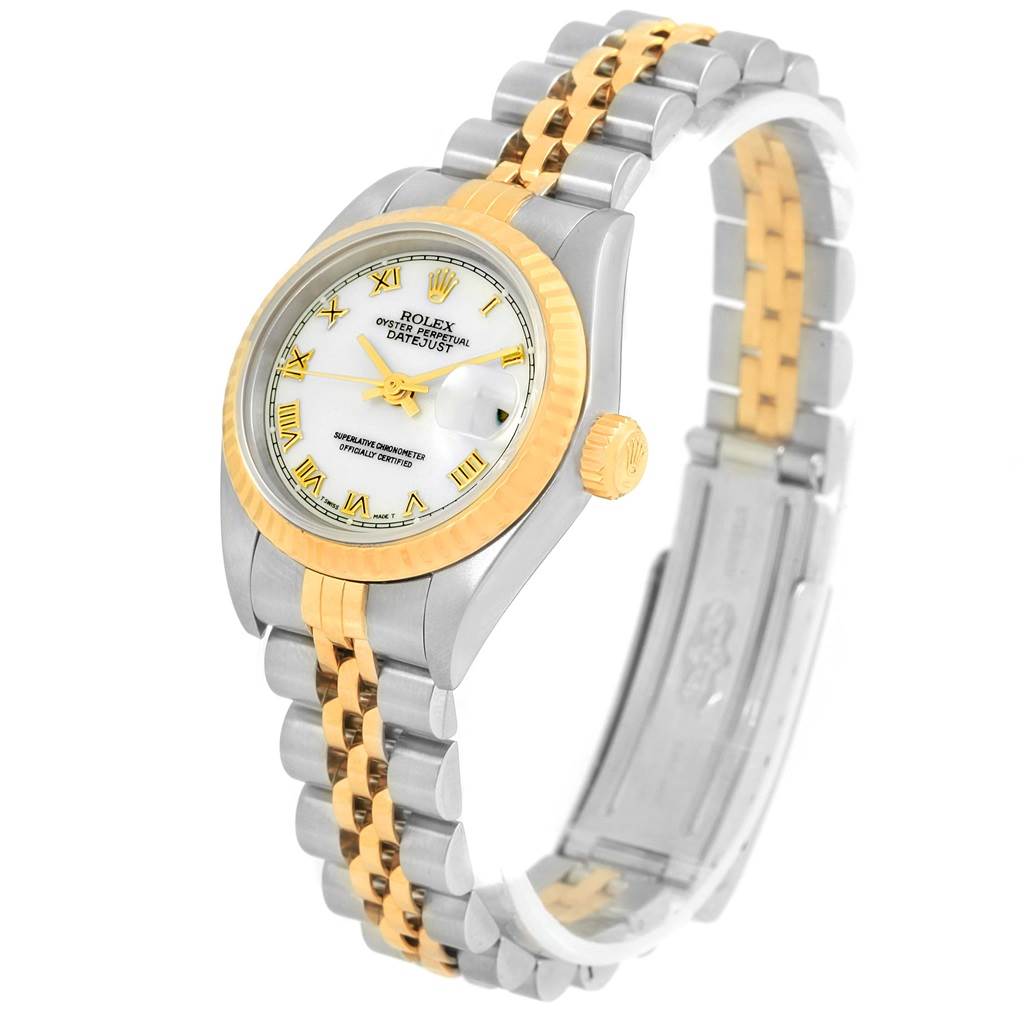 The Rolex Datejust 79173 Women's Steel and Gold (two tone) White Dial 79173 Women's Steel and Gold (two tone) White Dial watch is shown at a slight angle, highlighting its two-tone bracelet, bezel, and white dial with Roman numerals.