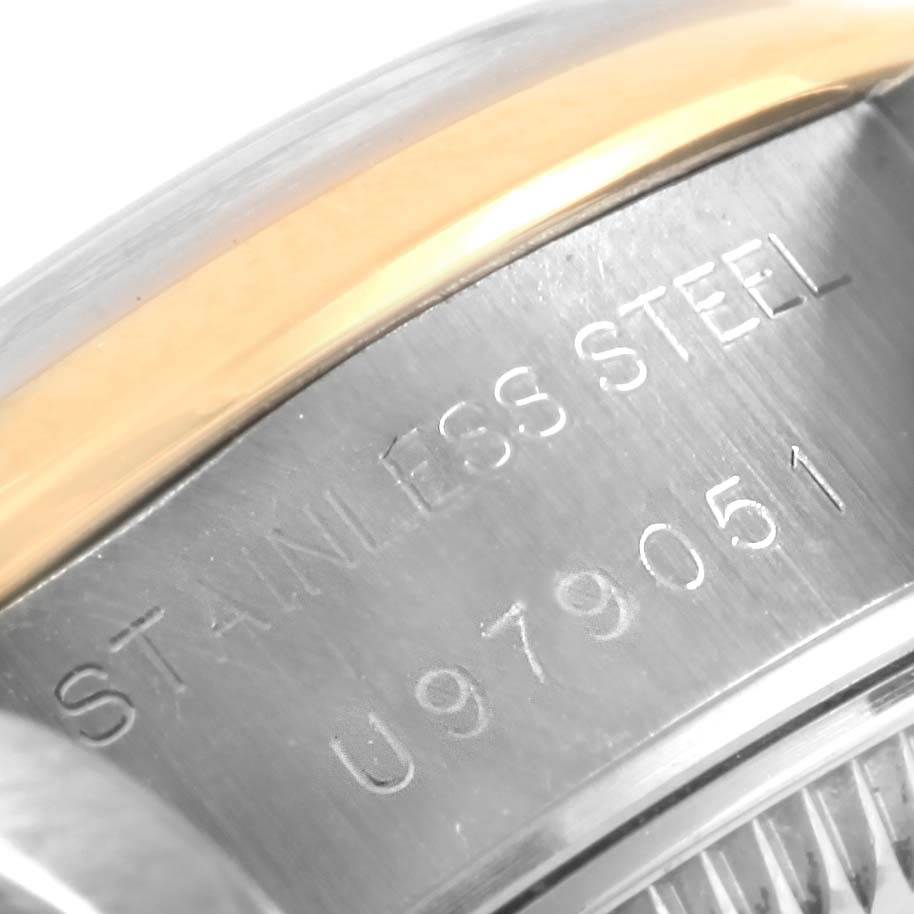 The image shows the stainless steel case back and some of the serial number of a Rolex Datejust 69163 Women's Stainless Steel Mother of Pearl Dial 69163 Women's Stainless Steel Mother of Pearl Dial watch.