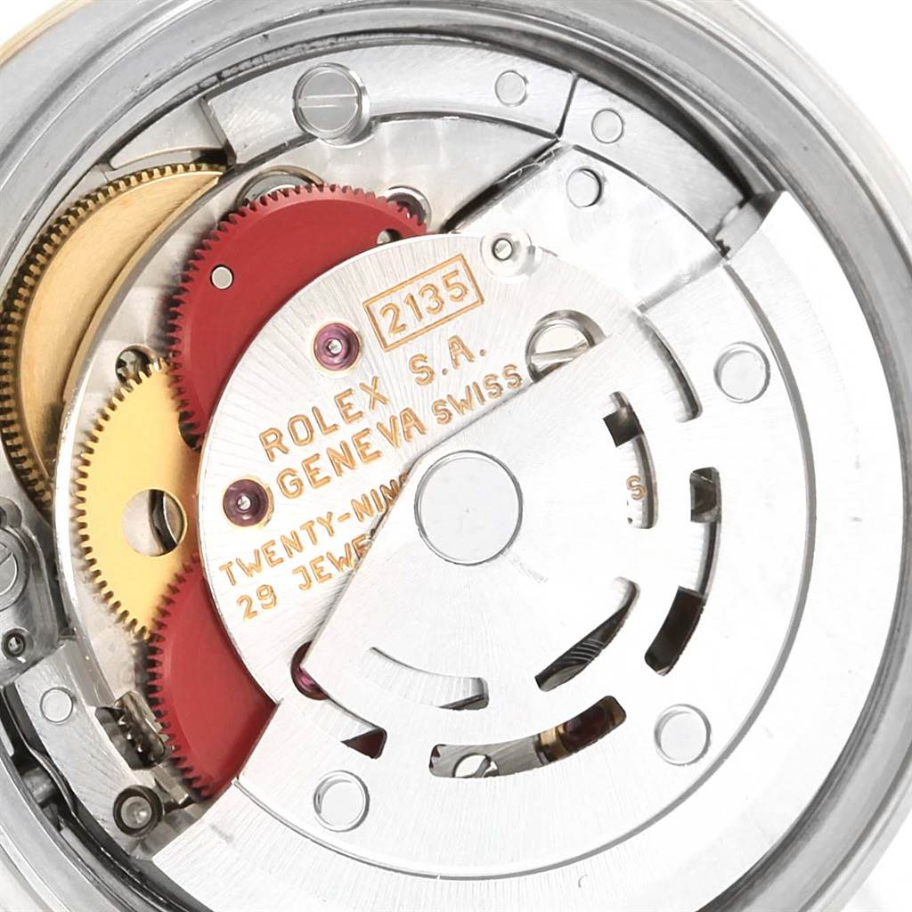This image shows a close-up of the movement mechanism inside a Rolex Datejust 69163 Women's Stainless Steel Mother of Pearl Dial 69163 Women's Stainless Steel Mother of Pearl Dial watch, highlighting its intricate parts.