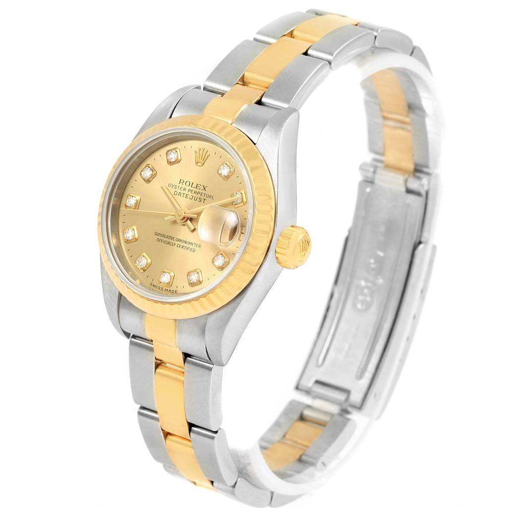 The image shows a side angle of a Rolex Datejust 69173 Women's Stainless Steel Champagne Dial 69173 Women's Stainless Steel Champagne Dial watch, highlighting its gold bezel, crown, and two-tone bracelet.