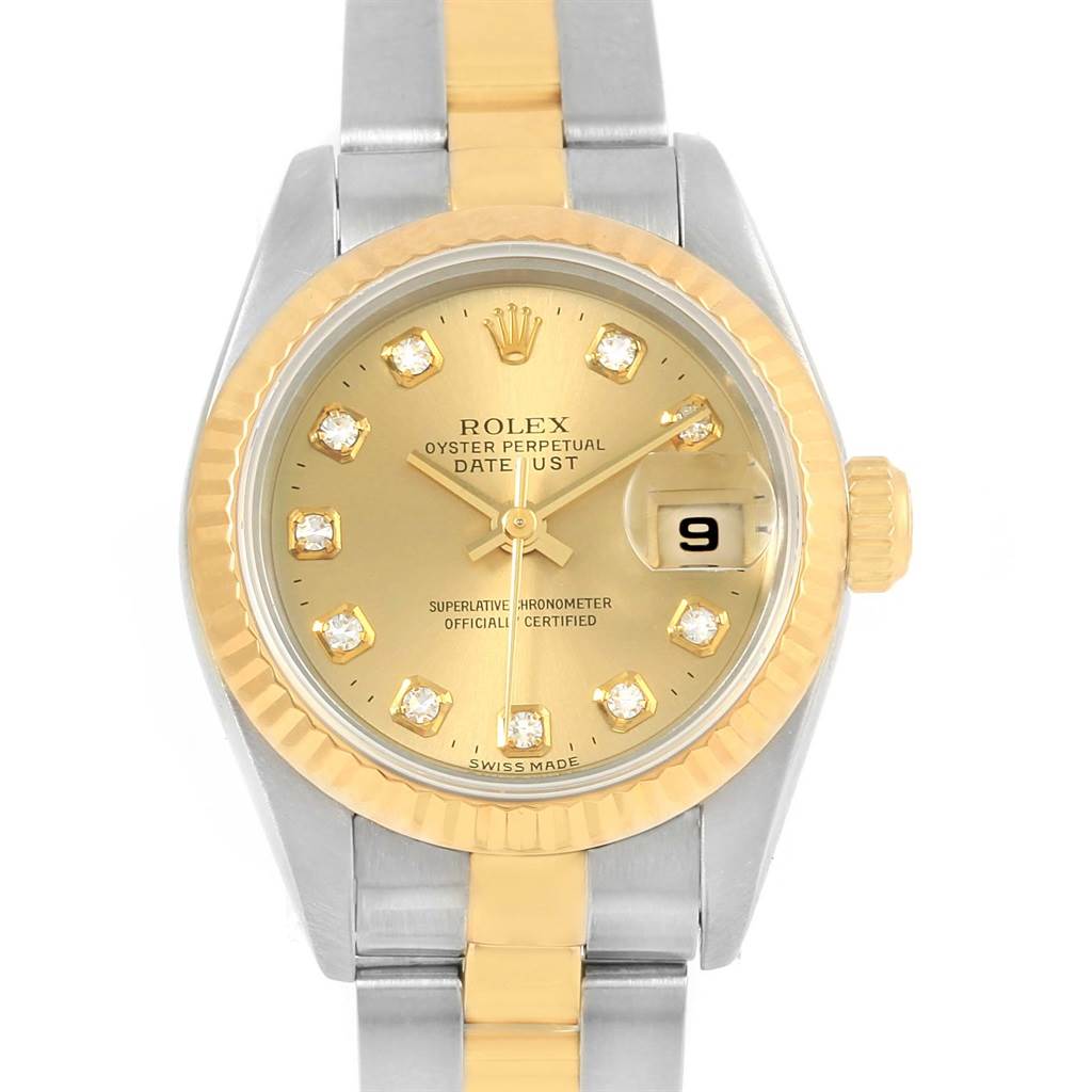 The image shows a front view of a Rolex Datejust 69173 Women's Stainless Steel Champagne Dial 69173 Women's Stainless Steel Champagne Dial watch featuring a gold dial, diamond hour markers, and a gold and silver bracelet.
