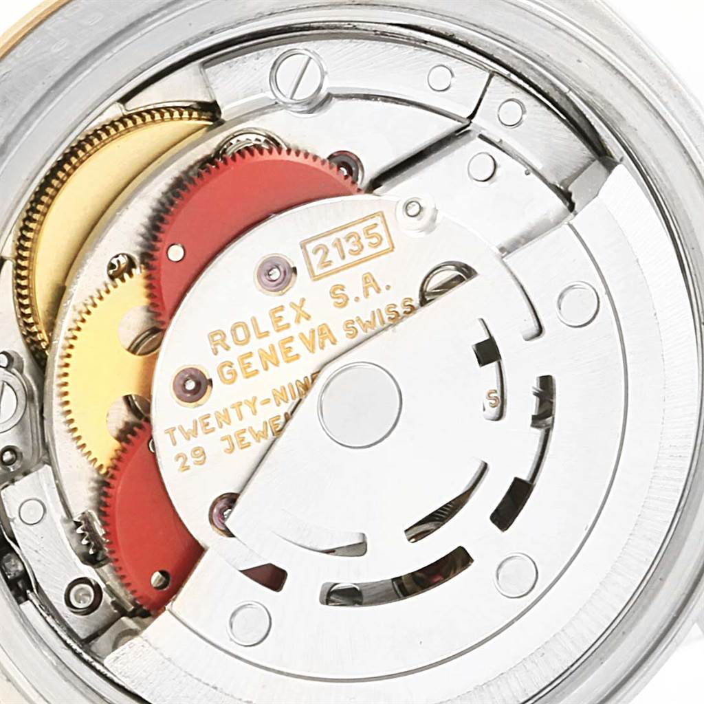 This close-up image shows the movement mechanism of the Rolex Datejust 69163 Women's Stainless Steel Blue Dial 69163 Women's Stainless Steel Blue Dial model, highlighting gears and intricate internal components.