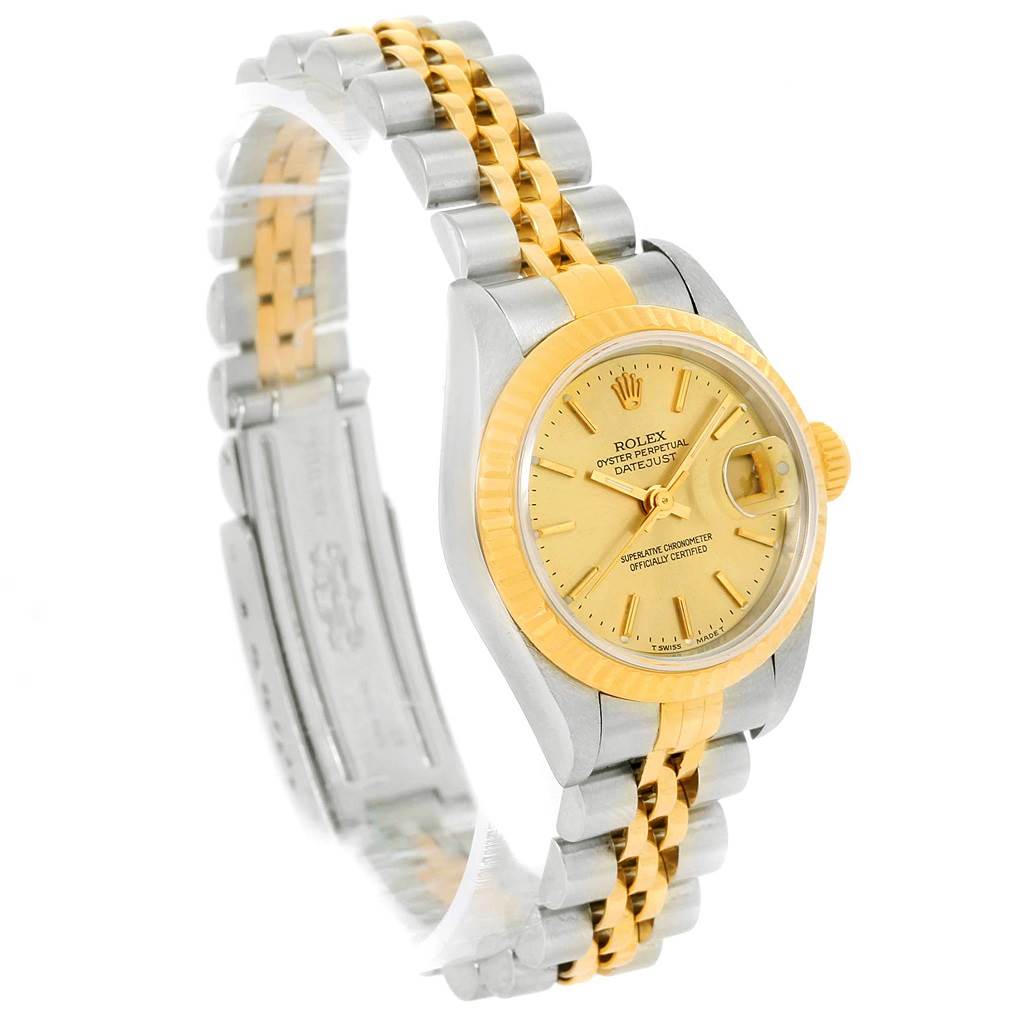 The Rolex Datejust 69173 Women's Stainless Steel Champagne Dial 69173 Women's Stainless Steel Champagne Dial watch is shown at an angle highlighting its face, bezel, and two-tone bracelet.