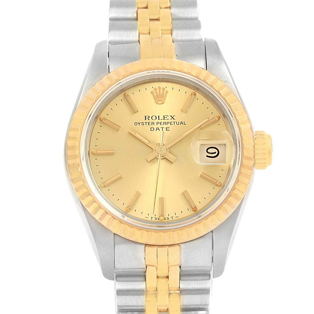 This image shows a close-up of the Rolex Datejust 69173 Women's Stainless Steel Champagne Dial 69173 Women's Stainless Steel Champagne Dial watch face, bezel, and part of the bracelet.