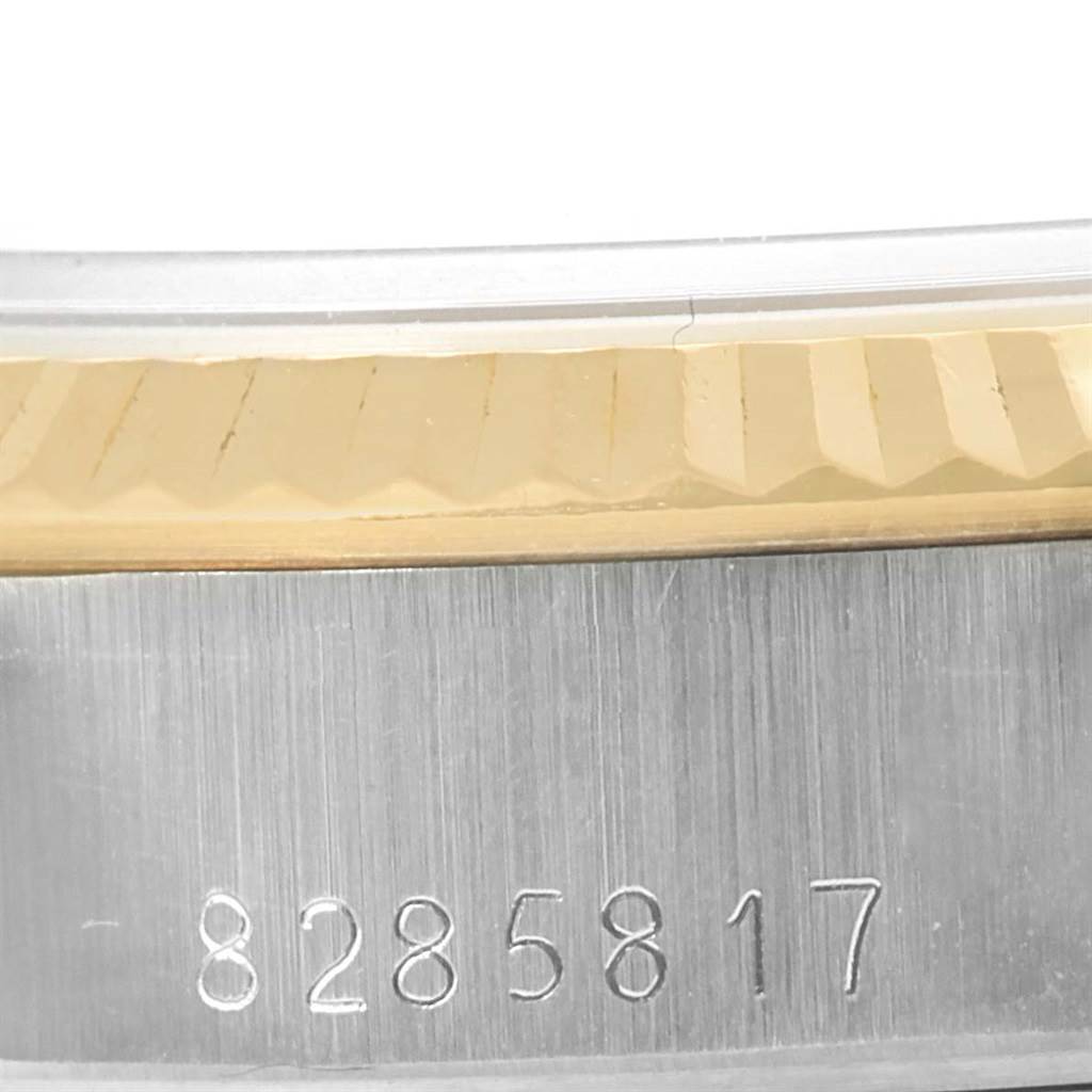 The close-up image shows the side view of the bezel and case of a Rolex Datejust 69173 Women's Stainless Steel Champagne Dial 69173 Women's Stainless Steel Champagne Dial watch.