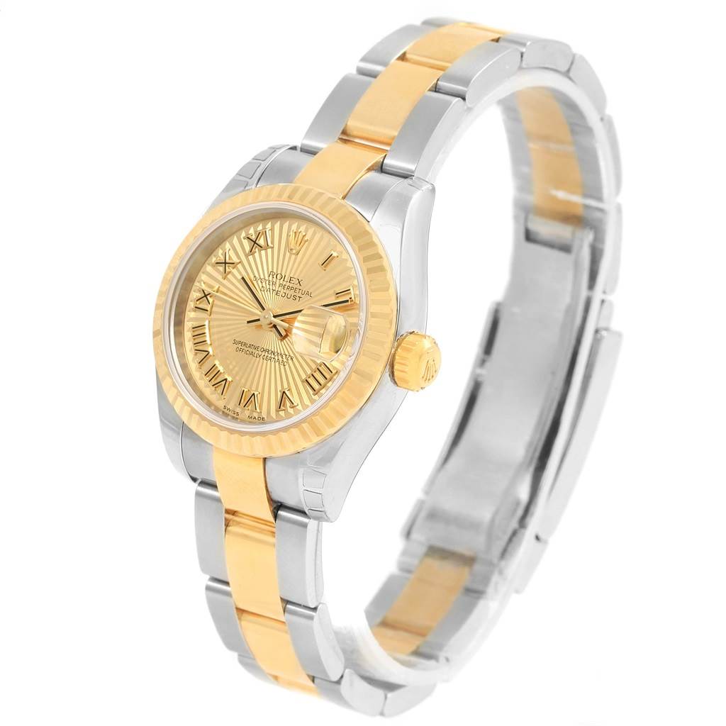 This image shows a Rolex Datejust 179173 Women's Steel and Gold (two tone) Champagne Dial 179173 Women's Steel and Gold (two tone) Champagne Dial watch from an angled front view, highlighting the dial, fluted bezel, and two-tone bracelet.