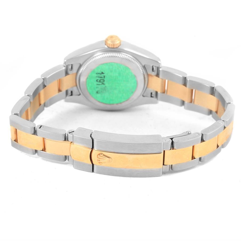 The image shows the back view of a Rolex Datejust 179173 Women's Steel and Gold (two tone) Champagne Dial 179173 Women's Steel and Gold (two tone) Champagne Dial watch, highlighting its two-tone bracelet and clasp.