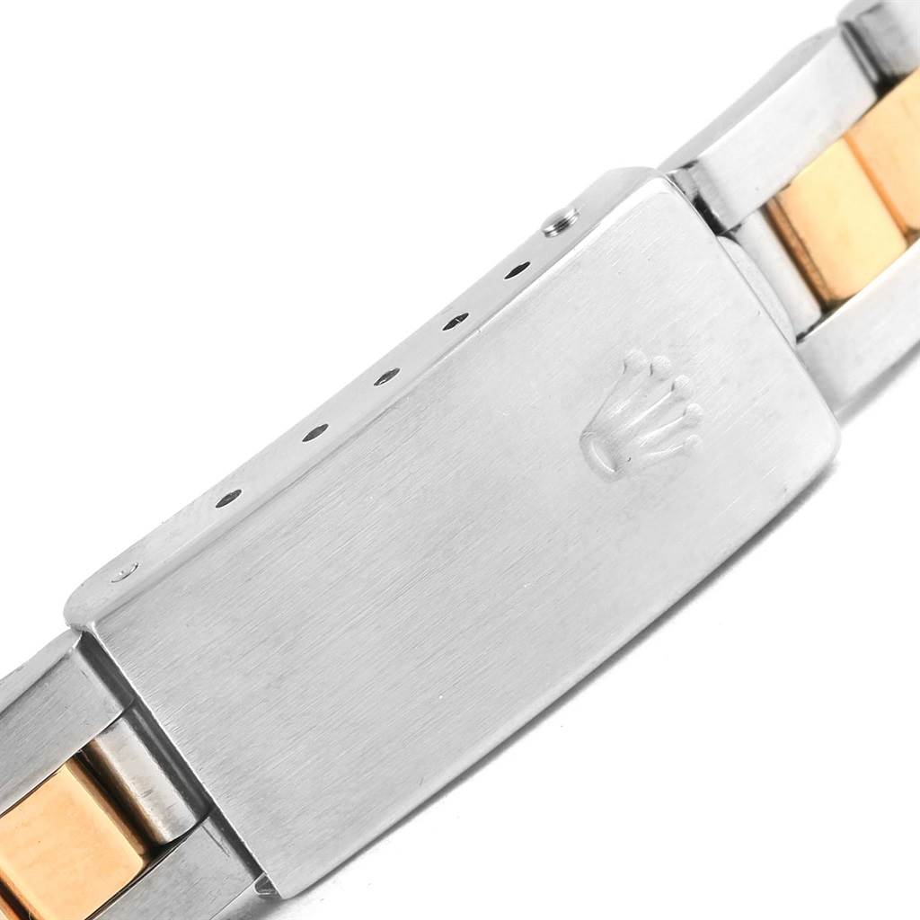 This image shows the clasp of a Rolex Datejust 69163 Women's Stainless Steel Grey Dial 69163 Women's Stainless Steel Grey Dial watch, emphasizing the Rolex crown logo and two-tone bracelet.
