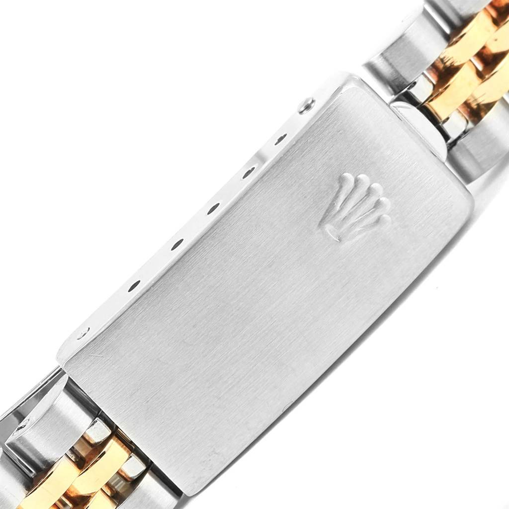 This image shows the clasp of a Rolex Datejust 69173 Women's Stainless Steel Champagne Dial 69173 Women's Stainless Steel Champagne Dial watch, featuring a two-tone metal bracelet.
