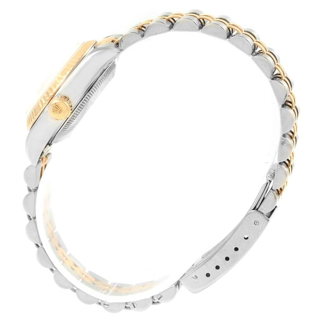 The image shows a side view of a Rolex Datejust 69173 Women's Stainless Steel Champagne Dial 69173 Women's Stainless Steel Champagne Dial watch, highlighting the watch case, crown, and the two-tone bracelet.