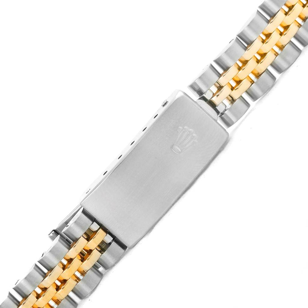 The image shows a close-up of the clasp on a Rolex Datejust 79173 Women's Steel and Gold (two tone) Silver Dial 79173 Women's Steel and Gold (two tone) Silver Dial watch bracelet.