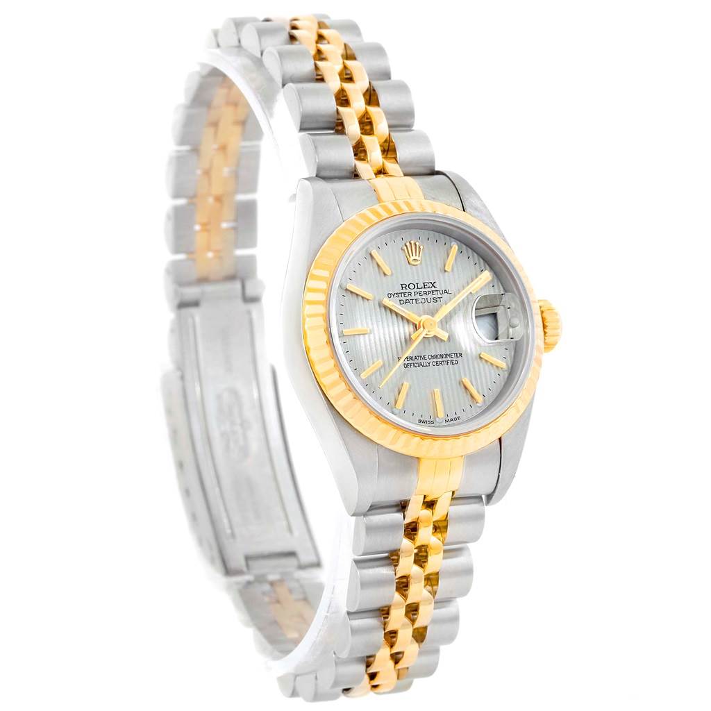 The image shows a Rolex Datejust 79173 Women's Steel and Gold (two tone) Silver Dial 79173 Women's Steel and Gold (two tone) Silver Dial watch with a two-tone bracelet and a silver dial with gold accents, viewed at an angle.