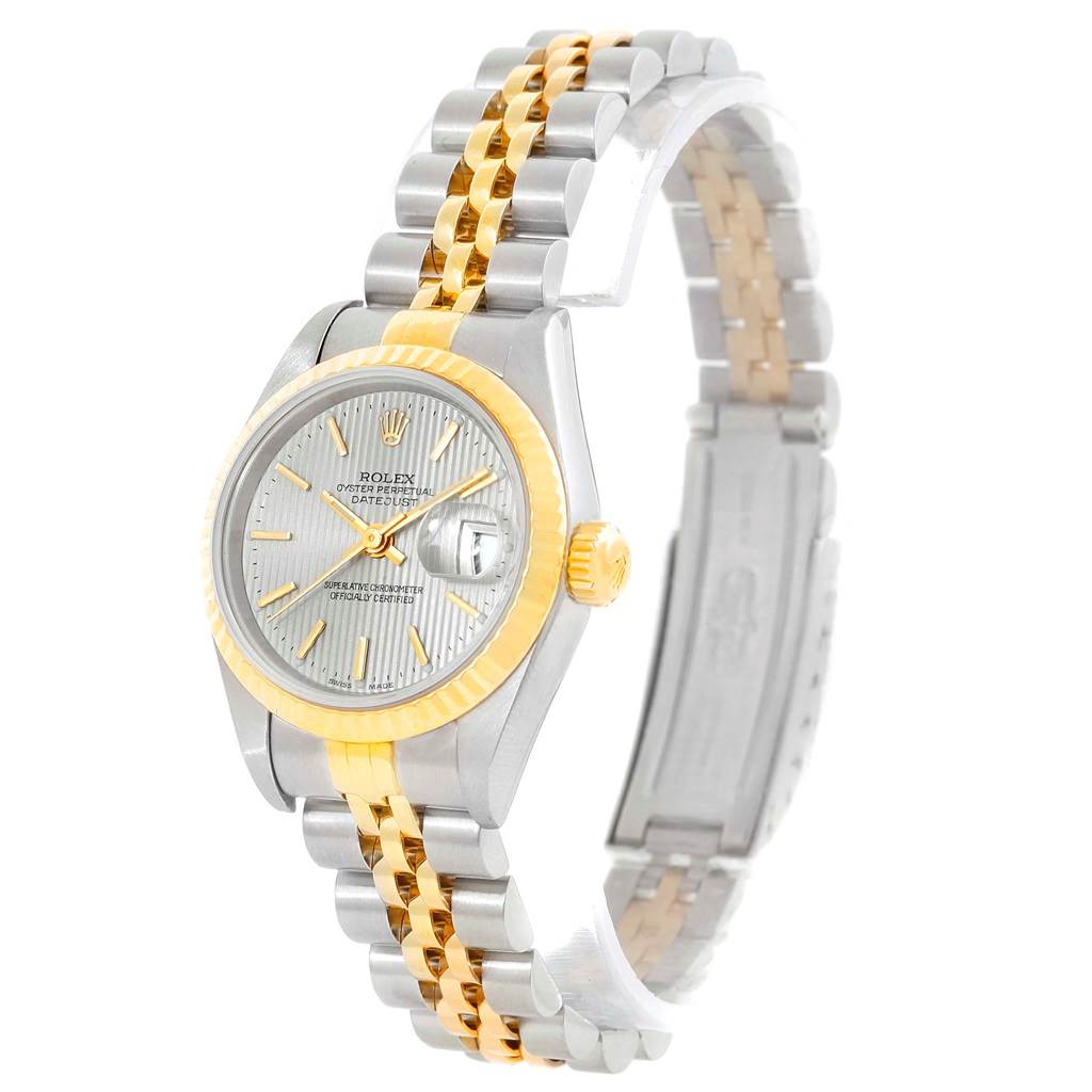 This image shows a side angle of a Rolex Datejust 79173 Women's Steel and Gold (two tone) Silver Dial 79173 Women's Steel and Gold (two tone) Silver Dial watch, displaying its face, bezel, crown, and bracelet.