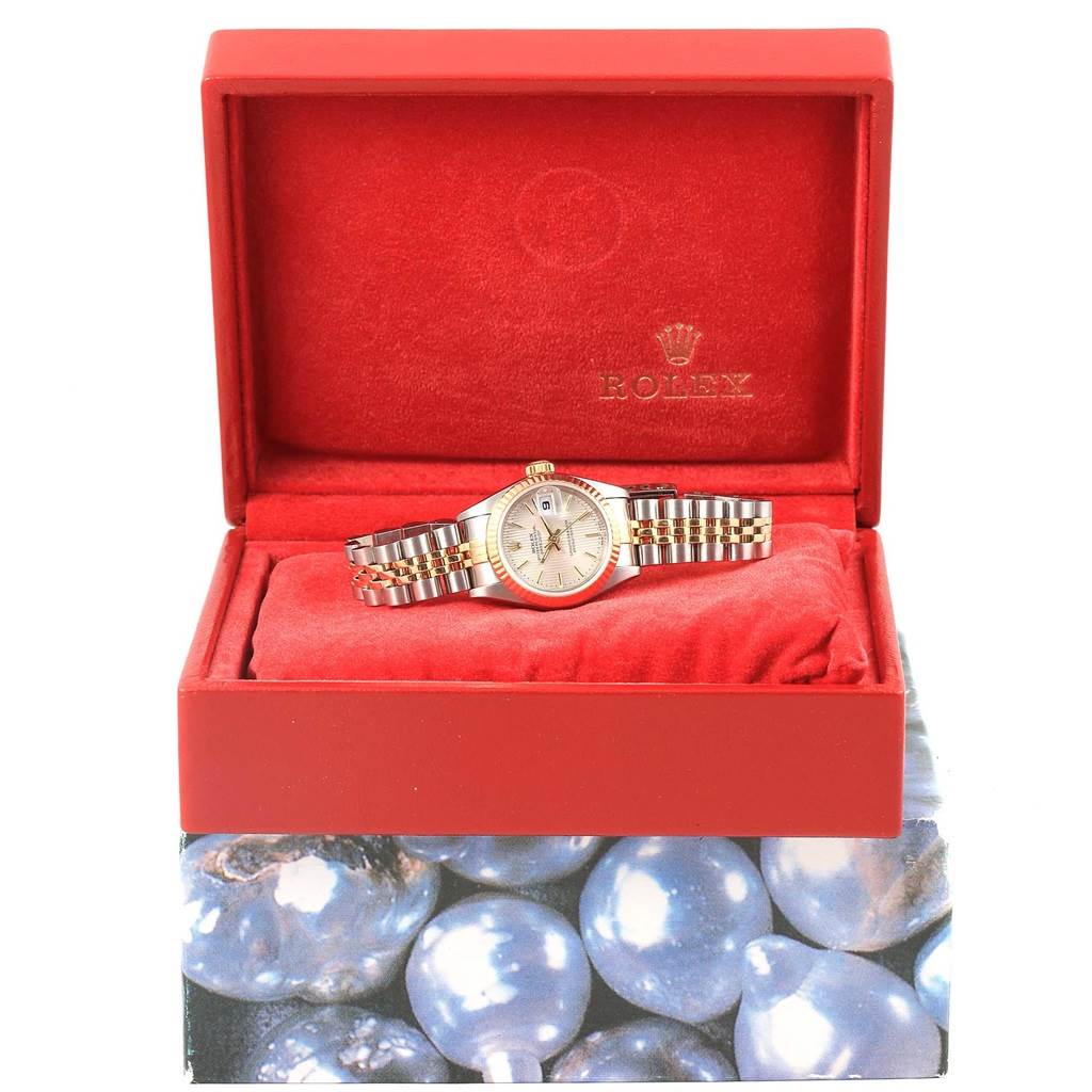 The image shows a Rolex Datejust 79173 Women's Steel and Gold (two tone) Silver Dial 79173 Women's Steel and Gold (two tone) Silver Dial watch in a red display box, viewed from the front at eye level.