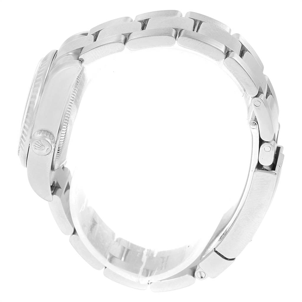 The image shows a side view of the Rolex Datejust 179174 Women
s Stainless Steel Mother of Pearl Dial 179174 Women
s Stainless Steel Mother of Pearl Dial watch, highlighting the bracelet and the crown.