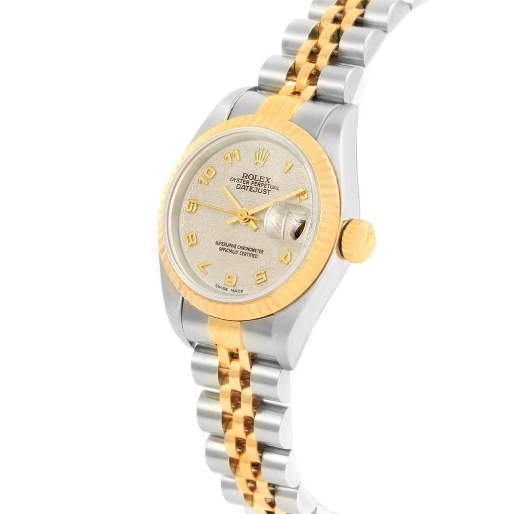 This is a Rolex Datejust 79173 Women's Steel and Gold (two tone) Beige Dial 79173 Women's Steel and Gold (two tone) Beige Dial watch, shown at a slight angle emphasizing the dial, bezel, crown, and part of the bracelet.