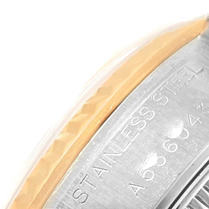 This image shows a close-up of the stainless steel case back edge with engravings of a Rolex Datejust 79173 Women's Steel and Gold (two tone) Beige Dial 79173 Women's Steel and Gold (two tone) Beige Dial watch.