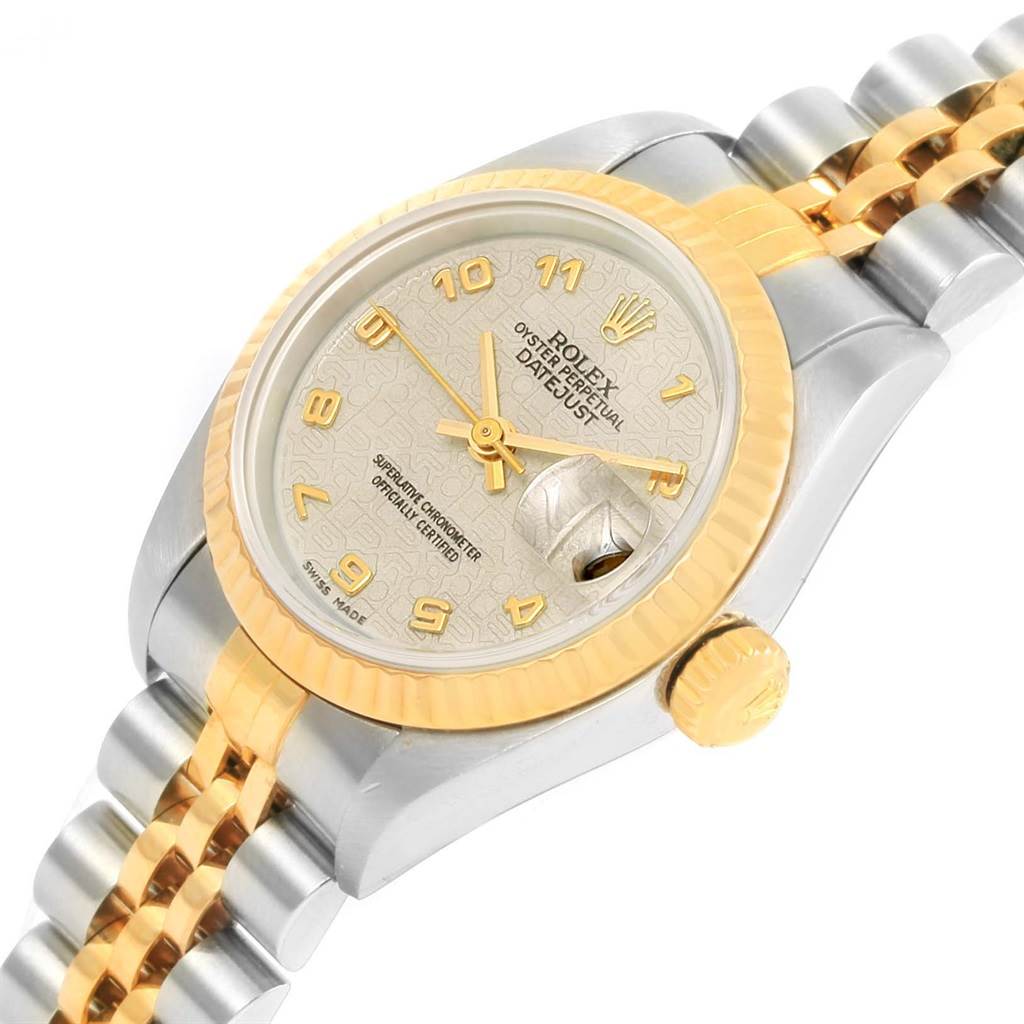 This image shows the face, crown, and part of the bracelet of a Rolex Datejust 79173 Women's Steel and Gold (two tone) Beige Dial 79173 Women's Steel and Gold (two tone) Beige Dial watch at a slight angle.