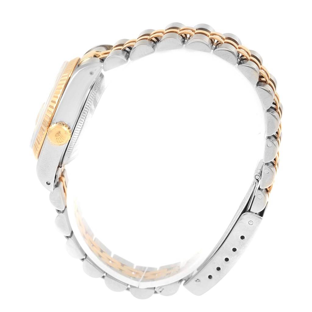 The image shows a side view of the Rolex Datejust 69173 Women's Stainless Steel Silver Dial 69173 Women's Stainless Steel Silver Dial model, focusing on the crown, case, and two-tone bracelet.