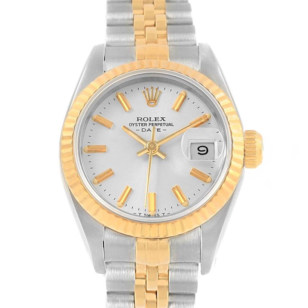 The image shows a Rolex Datejust 69173 Women's Stainless Steel Silver Dial 69173 Women's Stainless Steel Silver Dial watch with a silver dial, gold fluted bezel, and two-tone jubilee bracelet.