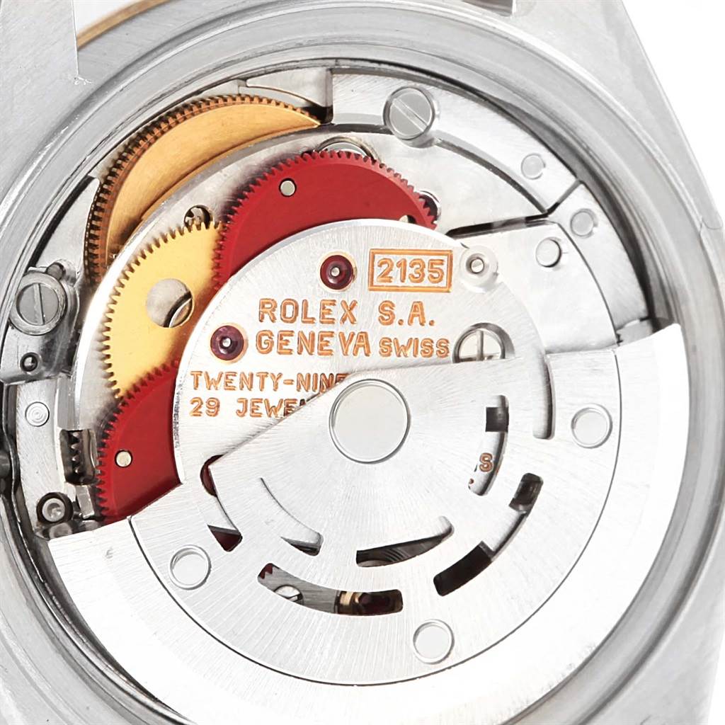 The image shows the internal mechanism of a Rolex Datejust 69173 Women's Stainless Steel Silver Dial 69173 Women's Stainless Steel Silver Dial watch, focusing on the movement labeled "ROLEX S.A. GENEVA SWISS."