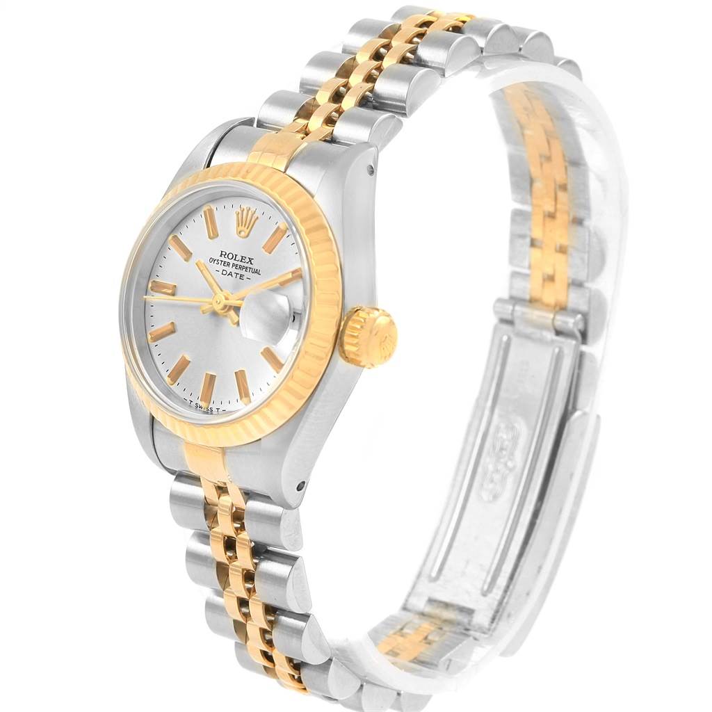 The Rolex Datejust 69173 Women's Stainless Steel Silver Dial 69173 Women's Stainless Steel Silver Dial watch is shown at an angle revealing the face, crown, bracelet, and clasp.