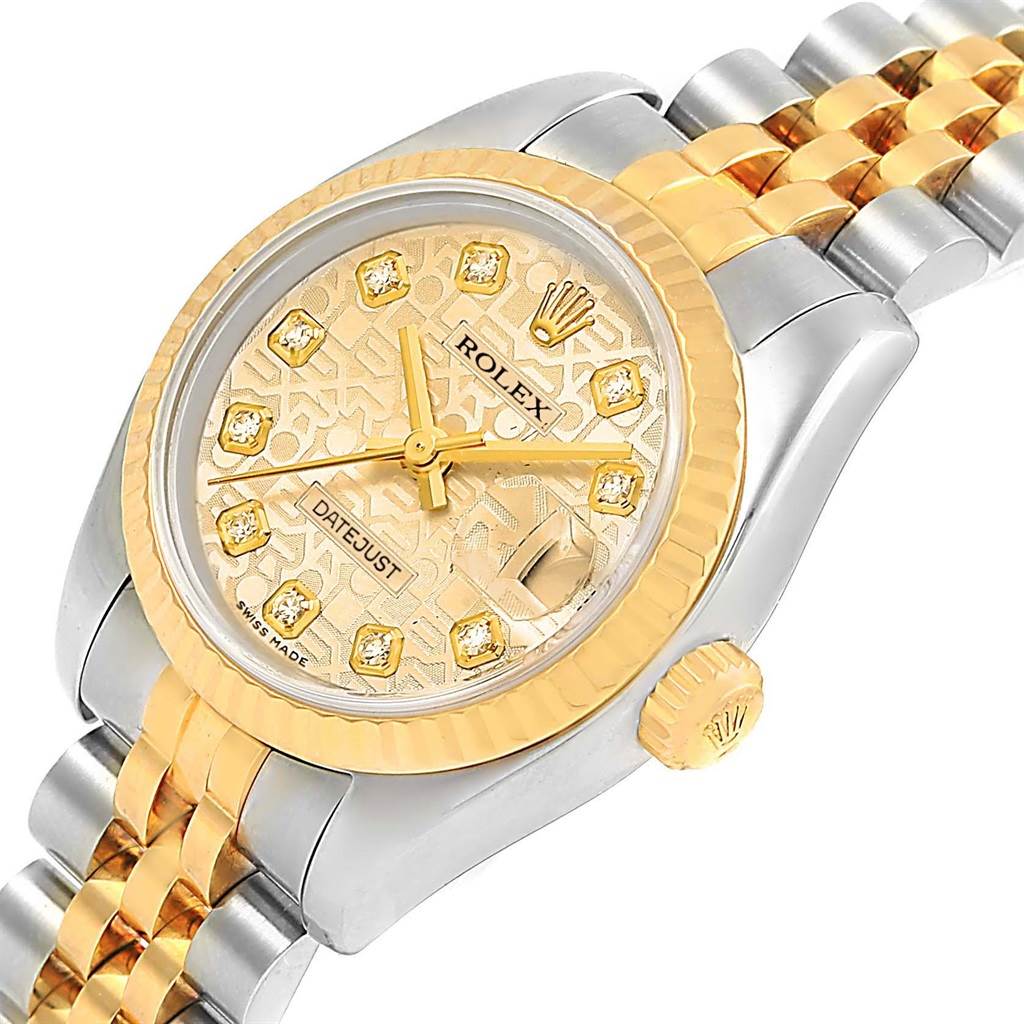 This image shows a close-up, angled view of the Rolex Datejust 179173 Women's Steel and Gold (two tone) Champagne Dial 179173 Women's Steel and Gold (two tone) Champagne Dial watch, highlighting the dial, bezel, and part of the bracelet.