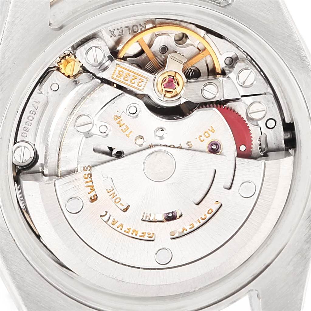 This is a close-up view of the mechanical movement inside a Rolex Datejust 179173 Women's Steel and Gold (two tone) Champagne Dial 179173 Women's Steel and Gold (two tone) Champagne Dial watch.