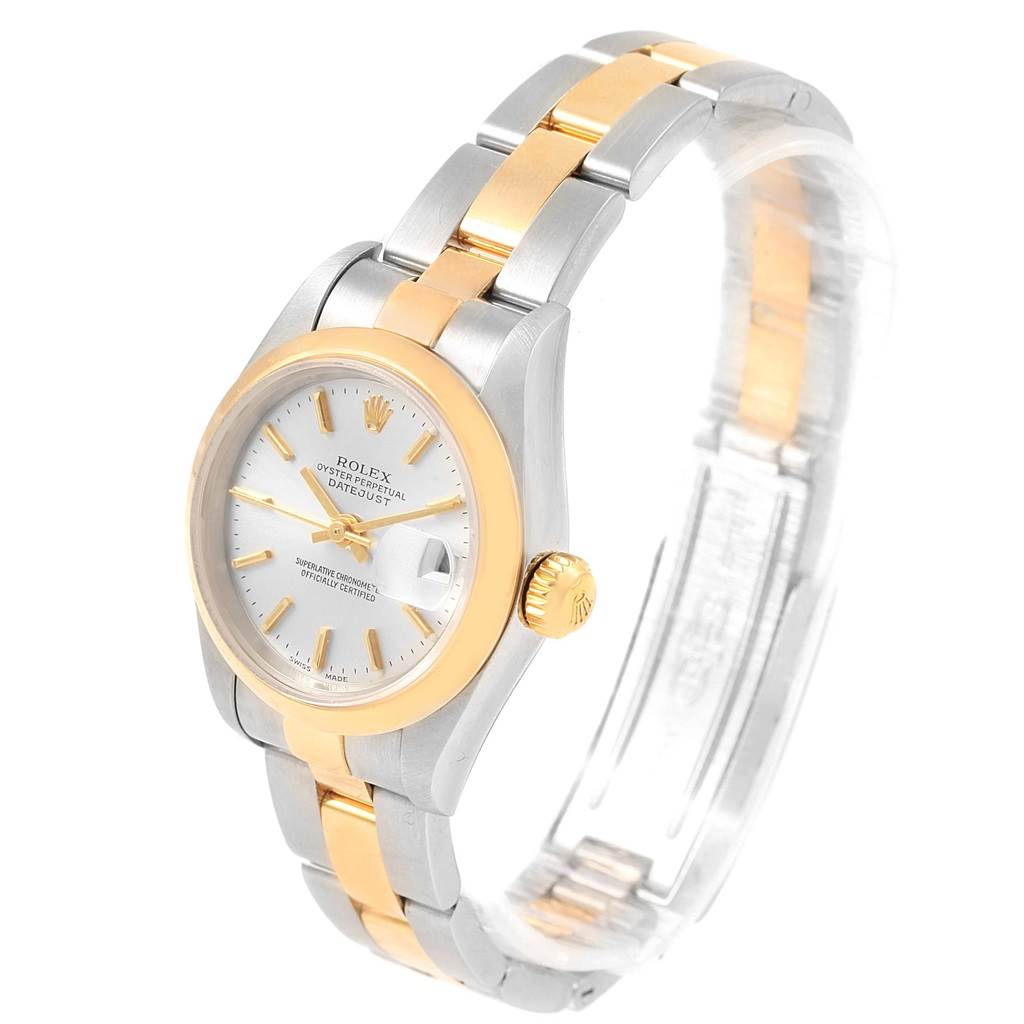 This image shows a Rolex Datejust 79163 Women's Steel and Gold (two tone) Silver Dial 79163 Women's Steel and Gold (two tone) Silver Dial watch at a three-quarter angle, highlighting the face, bezel, and part of the bracelet.