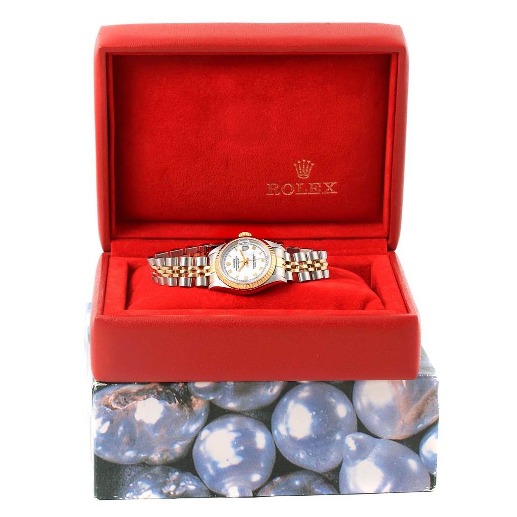 The Rolex Datejust 69173 Women's Stainless Steel White Dial 69173 Women's Stainless Steel White Dial watch is shown from a frontal angle, displayed inside a red box with the brand's logo.