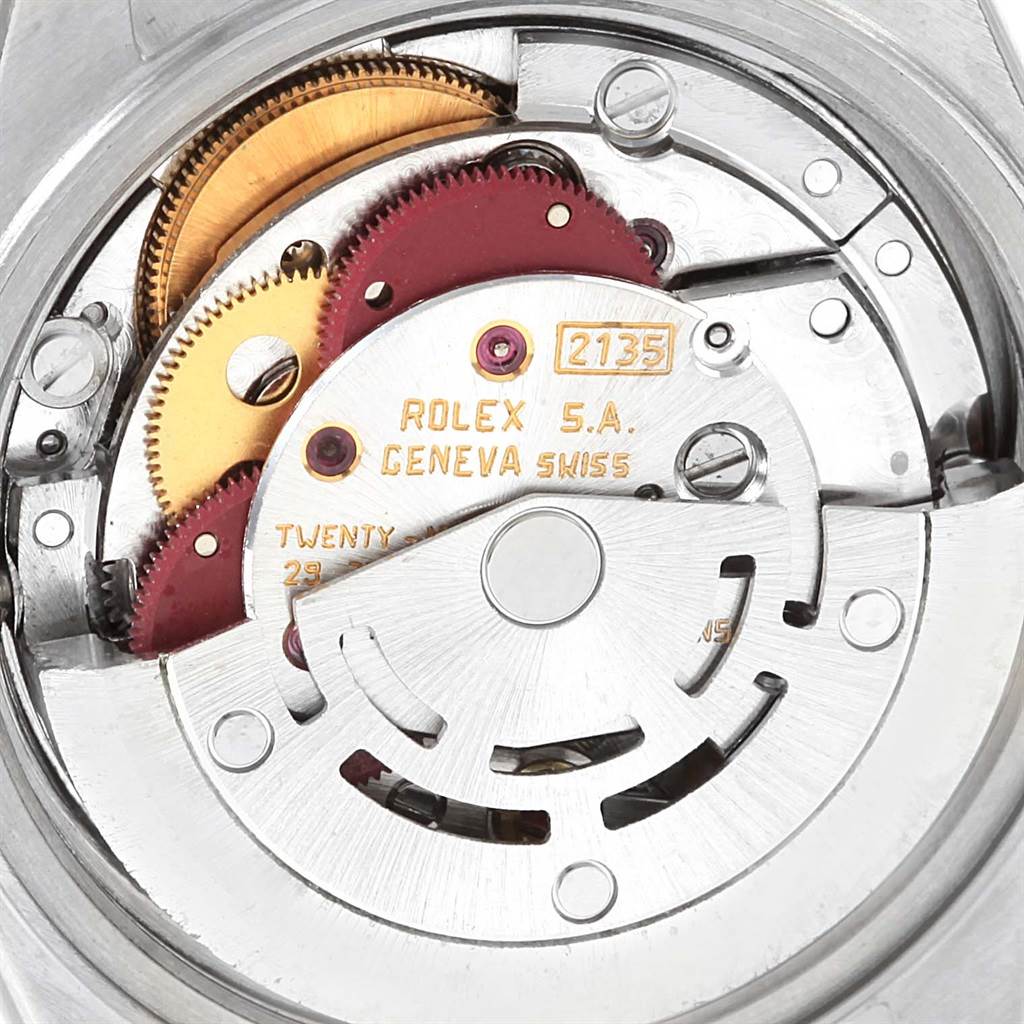 This image shows the movement mechanism of a Rolex Datejust 69173 Women's Stainless Steel Silver Dial 69173 Women's Stainless Steel Silver Dial watch, revealing its intricate gears and components.