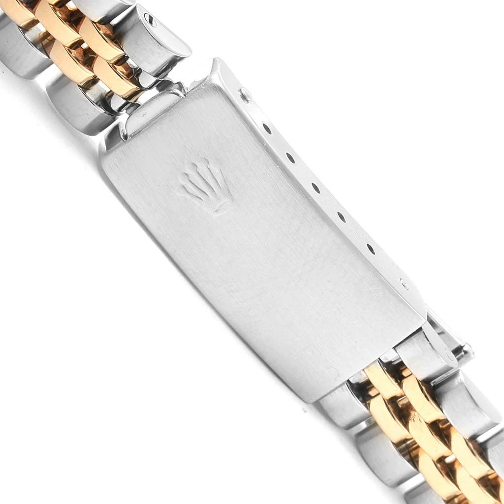 This image shows the clasp and part of the two-tone bracelet of a Rolex Datejust 69173 Women's Stainless Steel Silver Dial 69173 Women's Stainless Steel Silver Dial watch.