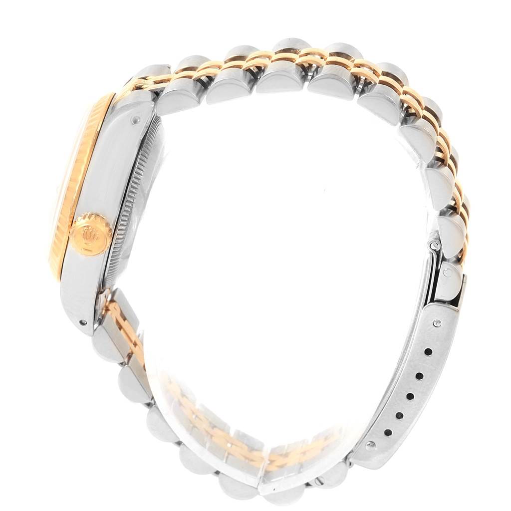 The image shows a side view of a Rolex Datejust 69173 Women's Stainless Steel Silver Dial 69173 Women's Stainless Steel Silver Dial, highlighting the crown, case, and two-tone bracelet.