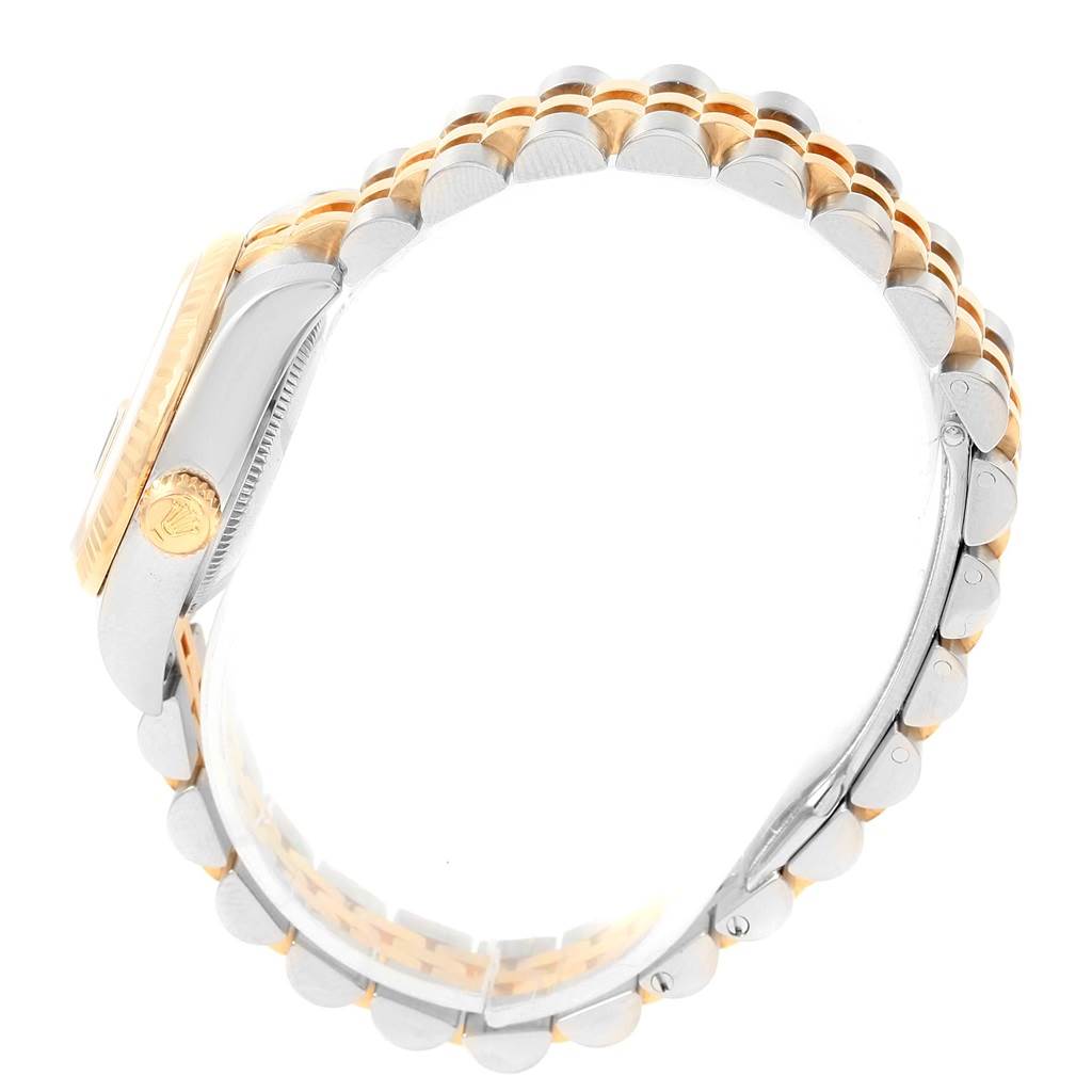 This image shows a side view of the Rolex Datejust 179173 Women's Steel and Gold (two tone) Black Dial 179173 Women's Steel and Gold (two tone) Black Dial watch, highlighting its case, bracelet, and crown.