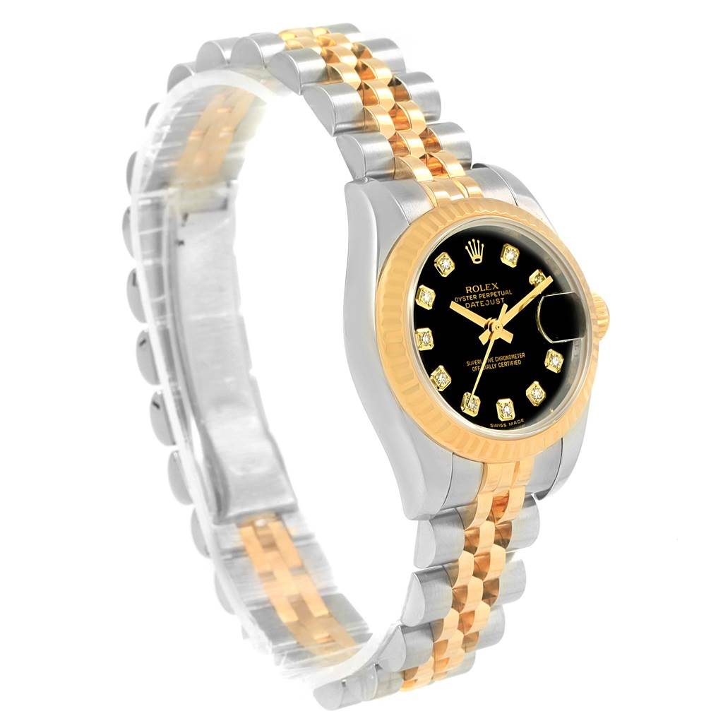 This image shows a Rolex Datejust 179173 Women's Steel and Gold (two tone) Black Dial 179173 Women's Steel and Gold (two tone) Black Dial watch at a side angle, highlighting its two-tone bracelet, black dial, and diamond hour markers.