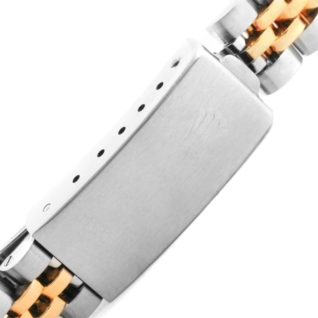 This image shows an angled close-up of the clasp and part of the bracelet of a Rolex Datejust 69173 Women's Stainless Steel White Dial 69173 Women's Stainless Steel White Dial watch.