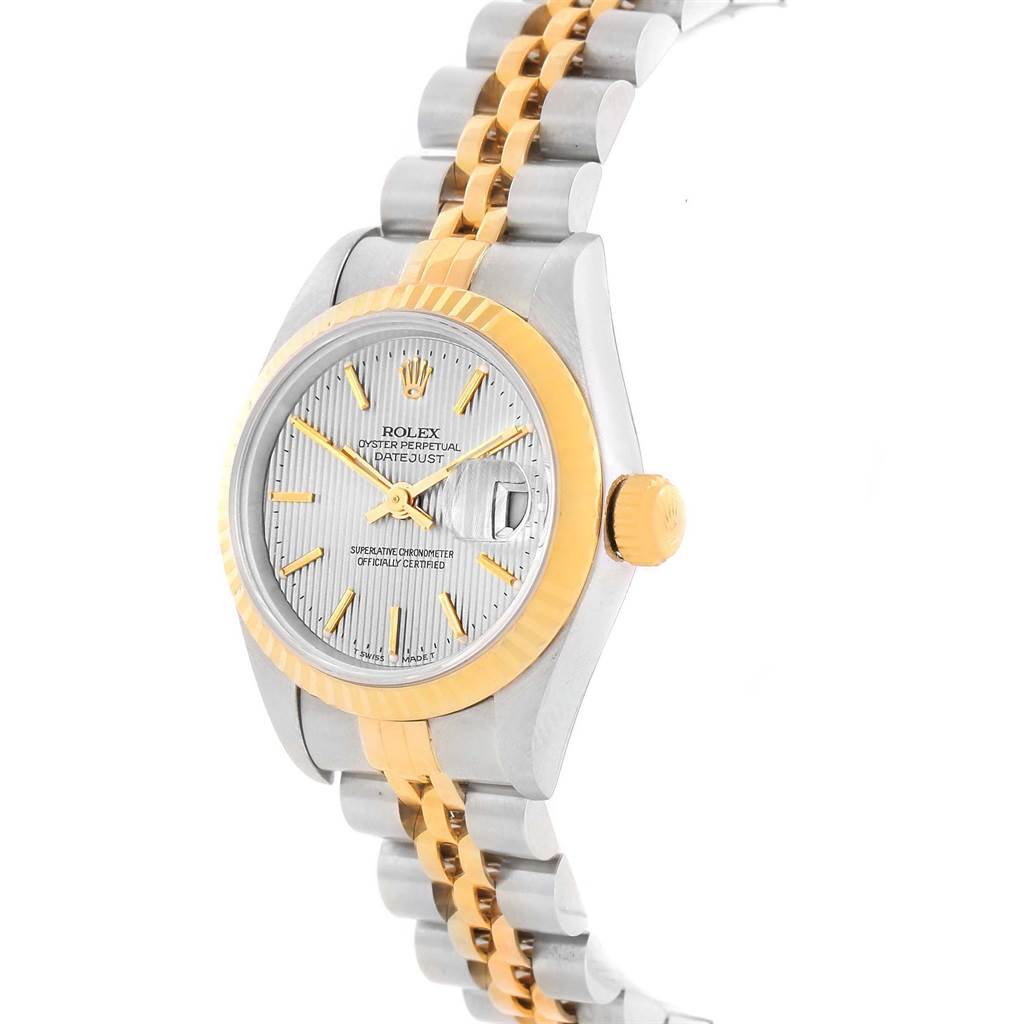 The image shows a Rolex Datejust 69173 Women's Stainless Steel Silver Dial 69173 Women's Stainless Steel Silver Dial watch from a side angle highlighting its two-tone bracelet, case, bezel, crown, and dial.