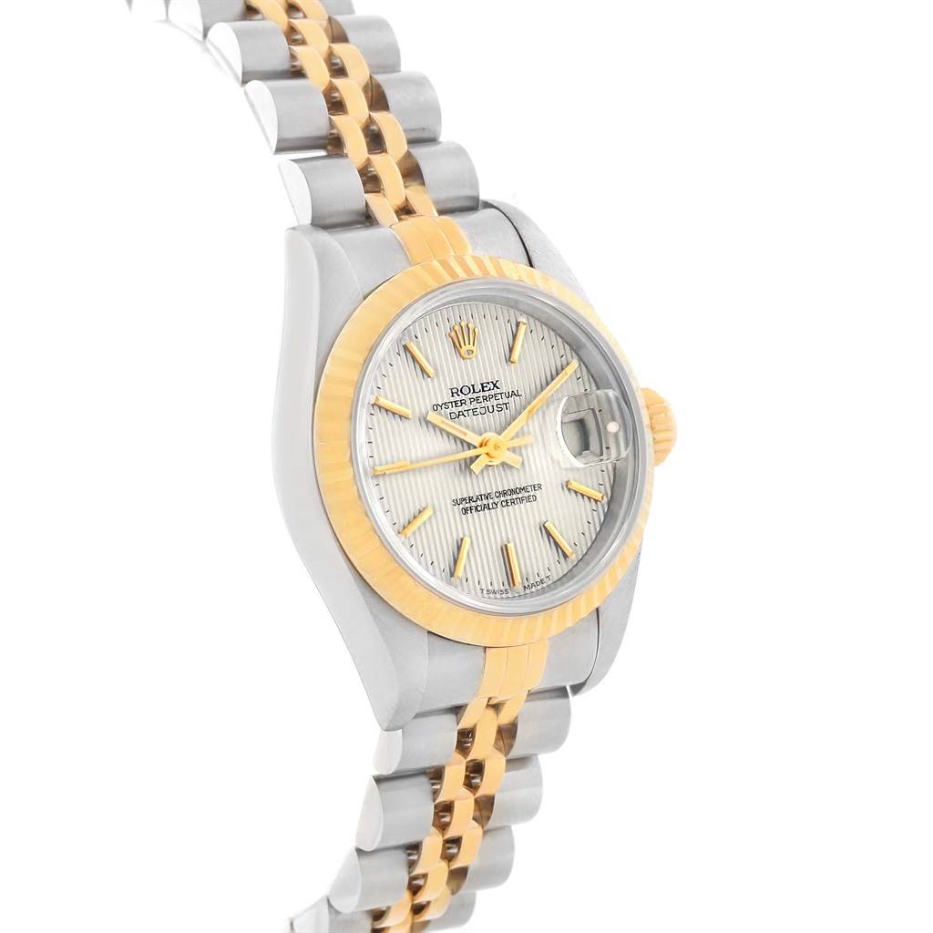 The image shows an angled side view of the Rolex Datejust 69173 Women's Stainless Steel Silver Dial 69173 Women's Stainless Steel Silver Dial model, highlighting the bezel, dial, and bracelet.