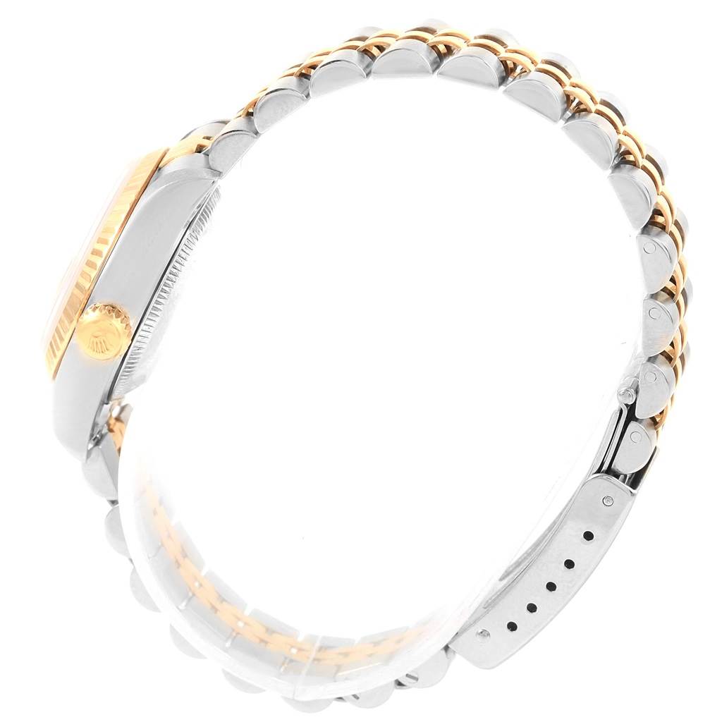 The image shows a side view of the Rolex Datejust 69173 Women's Stainless Steel Silver Dial 69173 Women's Stainless Steel Silver Dial watch, highlighting the case, bracelet, and crown.