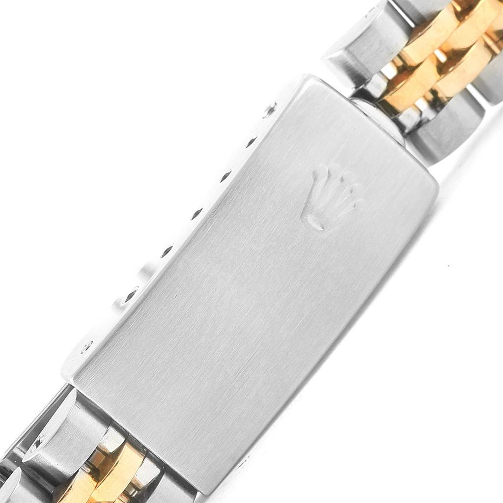 This image shows a close-up of the clasp on a Rolex Datejust 69173 Women's Stainless Steel Blue Dial 69173 Women's Stainless Steel Blue Dial watch, highlighting the brushed metal finish and logo.