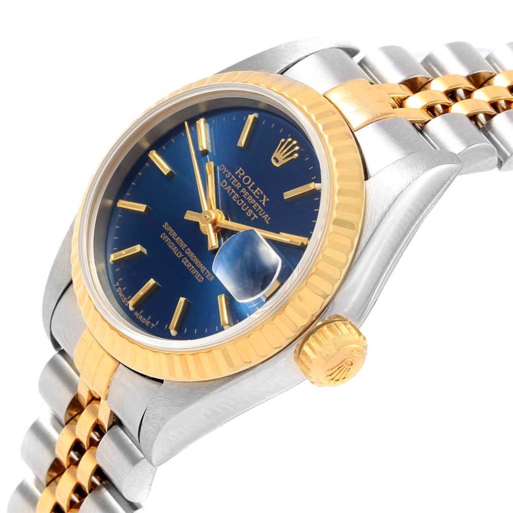 This Rolex Datejust 69173 Women's Stainless Steel Blue Dial 69173 Women's Stainless Steel Blue Dial watch is shown from a side angle highlighting the crown, bezel, and part of the jubilee bracelet.