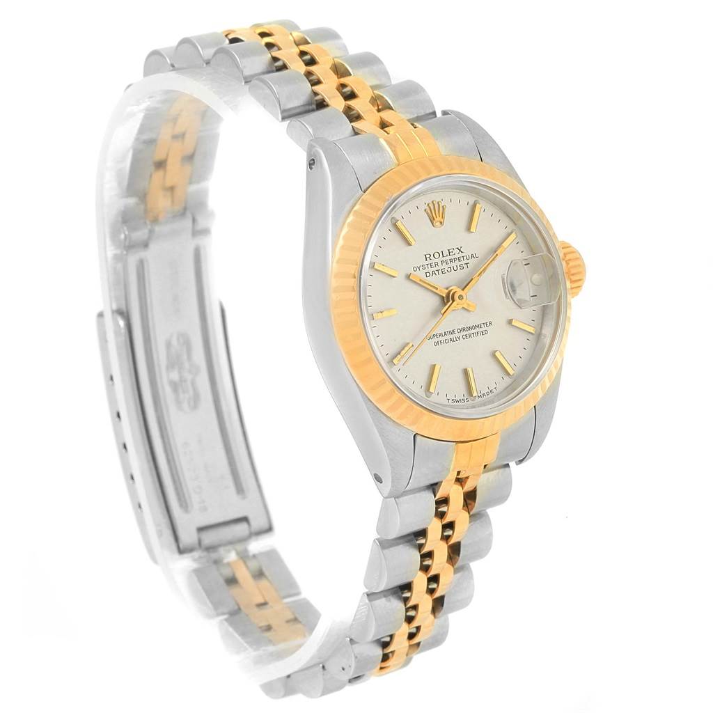 The image shows a side angle of a Rolex Datejust 69173 Women's Stainless Steel Silver Dial 69173 Women's Stainless Steel Silver Dial watch, showcasing its dual-tone band and gold bezel.
