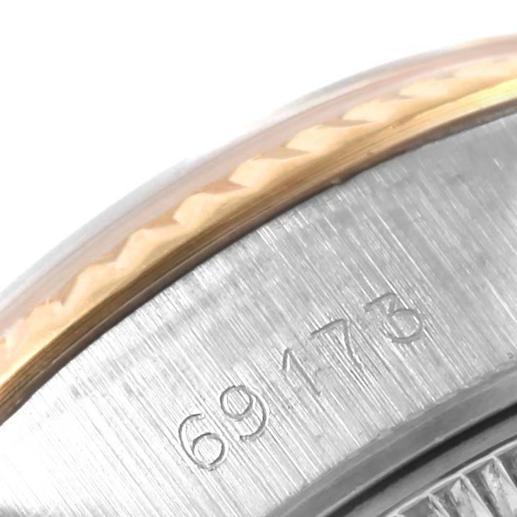 This image shows a close-up of the model number "69173" engraved on the side of a Rolex Datejust 69173 Women's Stainless Steel Silver Dial 69173 Women's Stainless Steel Silver Dial watch case.