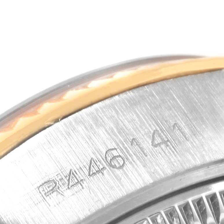This image shows a close-up of the bezel and casing of a Rolex Datejust 69173 Women's Stainless Steel Silver Dial 69173 Women's Stainless Steel Silver Dial watch.