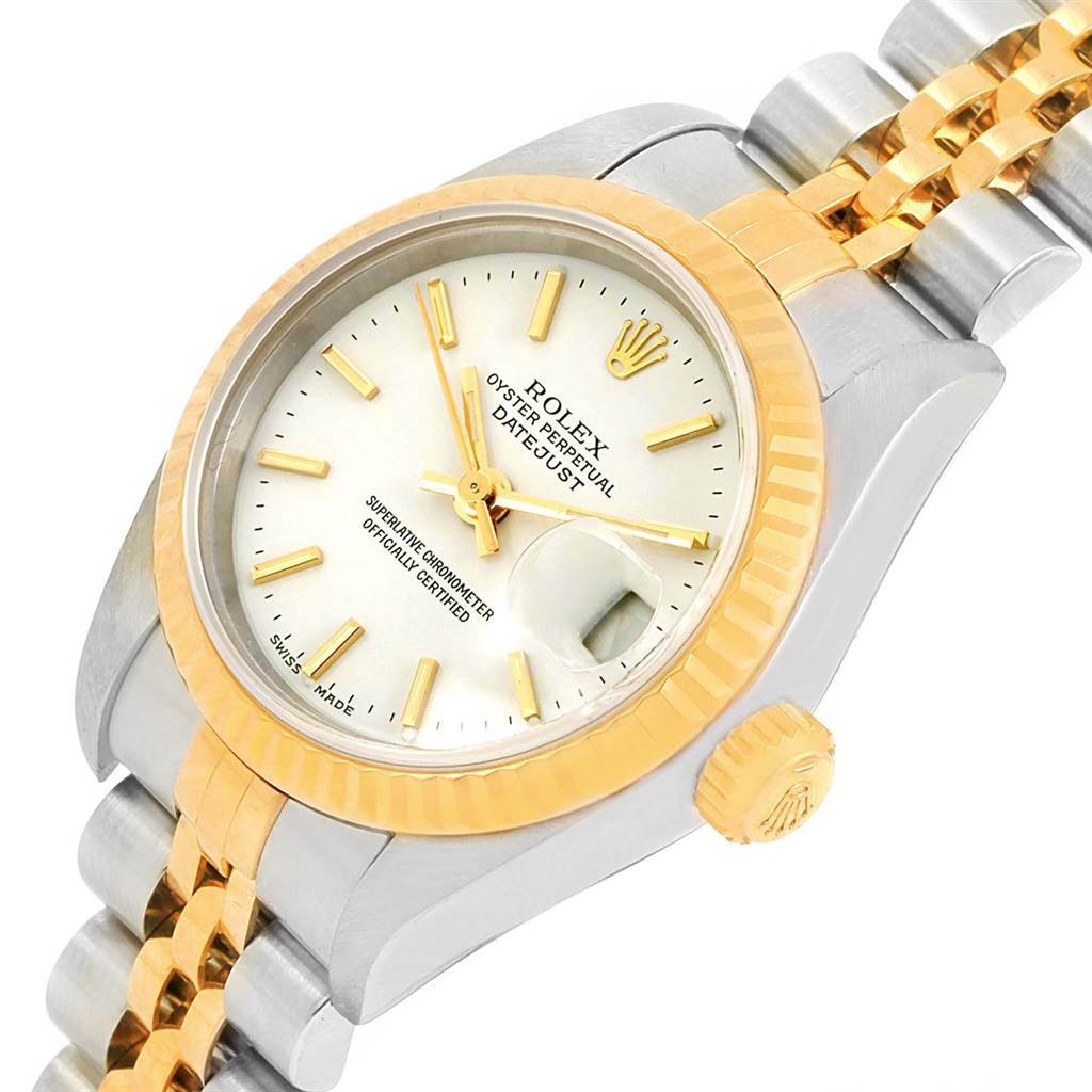 This image shows the Rolex Datejust 79173 Women's Steel and Gold (two tone) White Dial 79173 Women's Steel and Gold (two tone) White Dial watch at an angle highlighting the bezel, dial, and part of the bracelet.