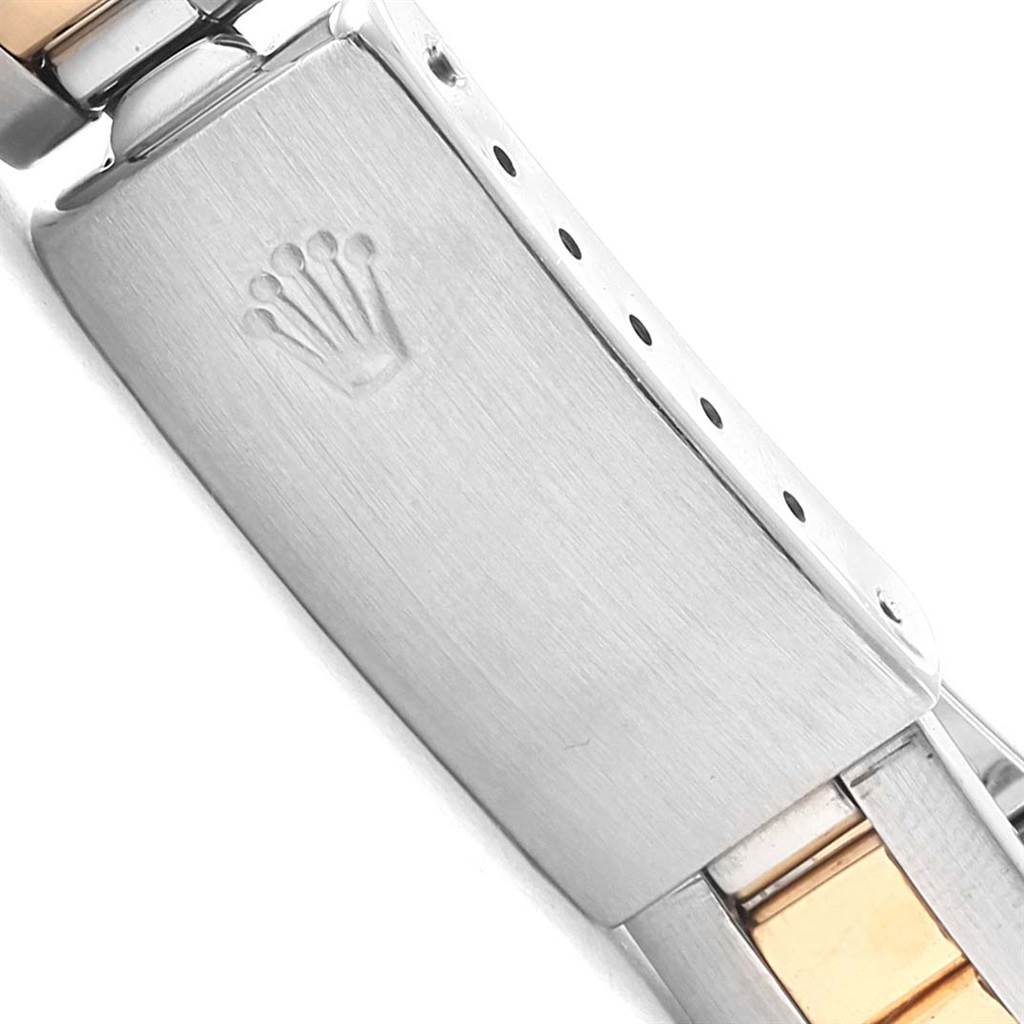 This image shows the clasp and part of the bracelet of a Rolex Datejust 76193 Women's Steel and Gold (two tone) Blue Dial 76193 Women's Steel and Gold (two tone) Blue Dial watch.